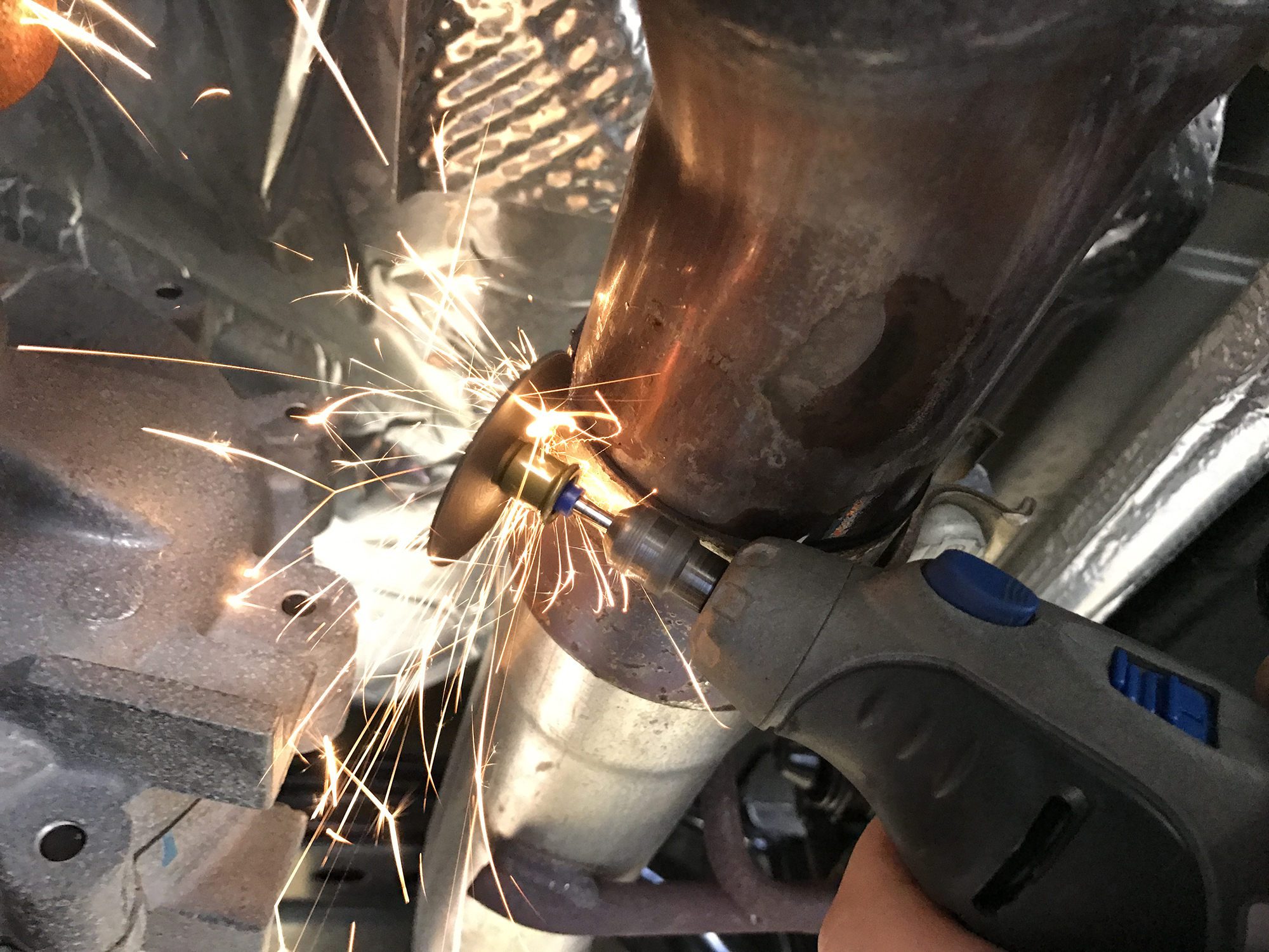 Step 6 - remove spot weld with cutoff wheel
