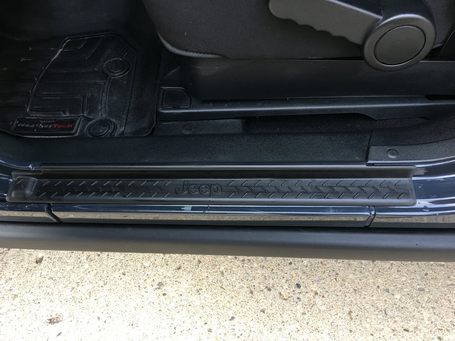 Mopar 82210104AB Door Sill Entry Guards in Black Plastic with Jeep Logo
