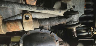 Step 6 - Remove the castle nut and lower the drag link to un-thread the old tie rod end.