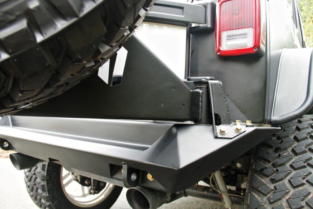Rear Bumper with Off-The-Door Tire Carrier. 