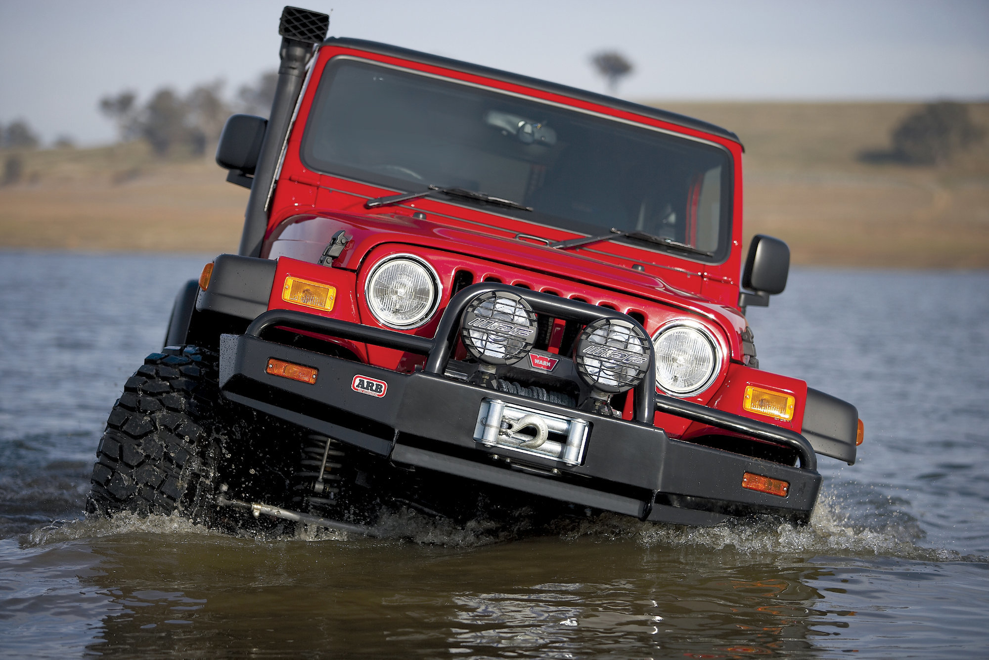 ARB 3450070 Deluxe Winch Bull Bar Bumper in Black for 97-06 Jeep Wrangler  TJ & Unlimited | Quadratec