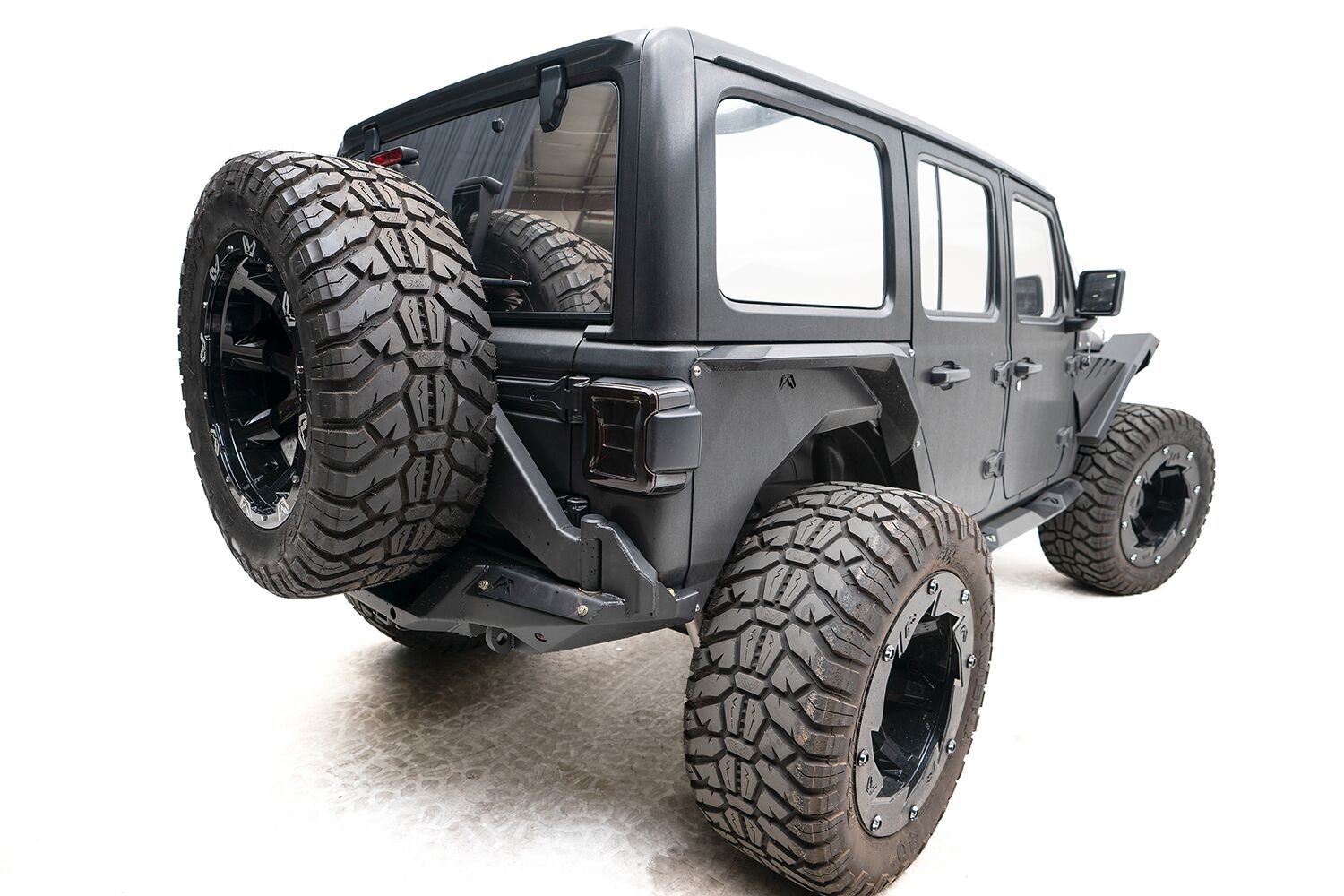 Fab Fours Off-The-Door Tire Carrier for 18-20 Jeep Wrangler JL | Quadratec