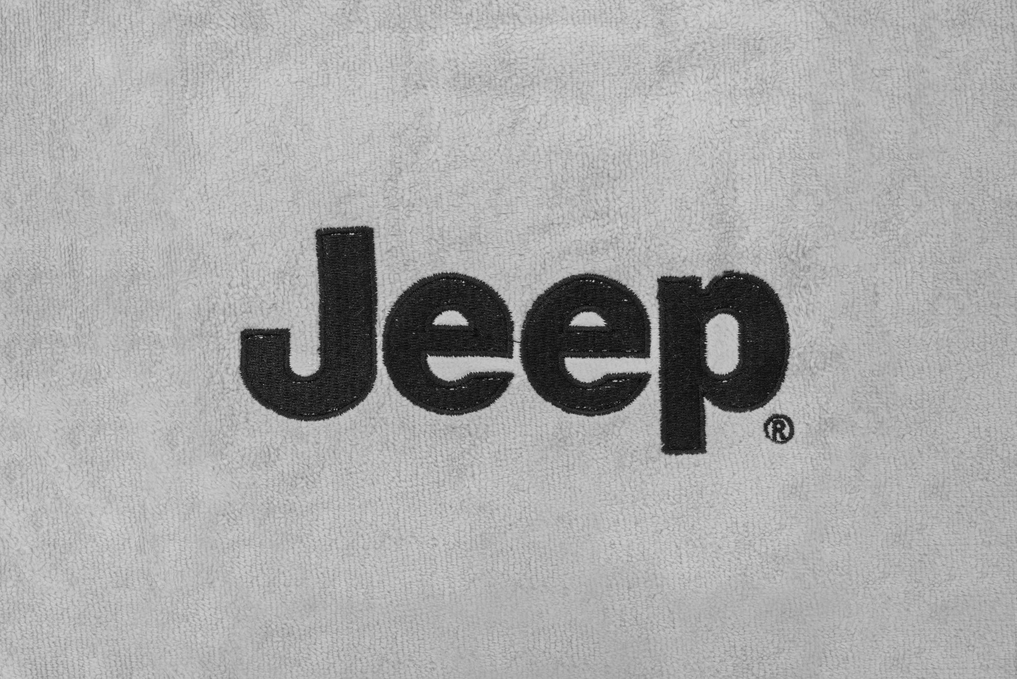 INSYNC-Jeep-logo-jeep-seat-towels-installed-gray-logo-closeup.jpg
