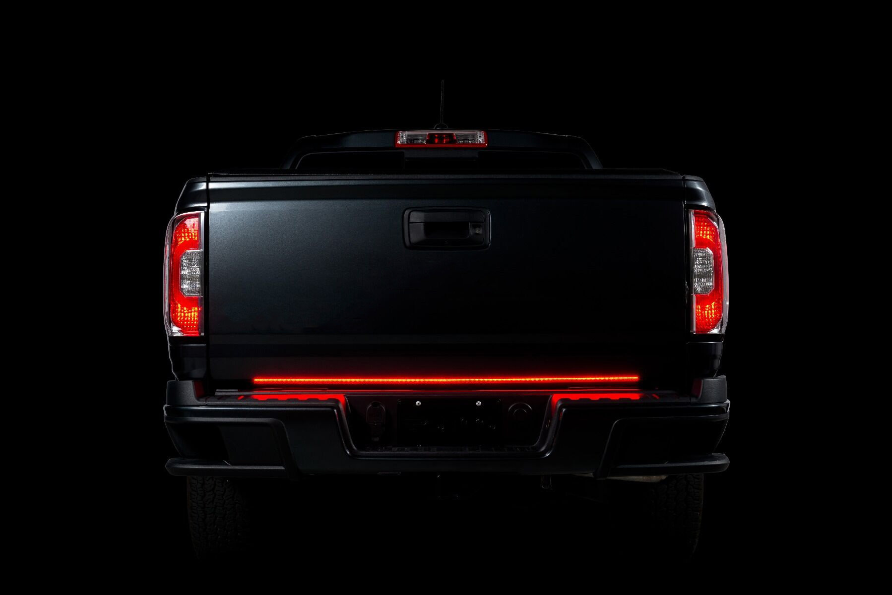 https://www.quadratec.com/sites/default/files/styles/product_zoomed/public/product_images/putco-97009-48-led-blade-48-inch-tailgate-light-bar-jeep-gladiator-jt-installed-backup-red.jpg