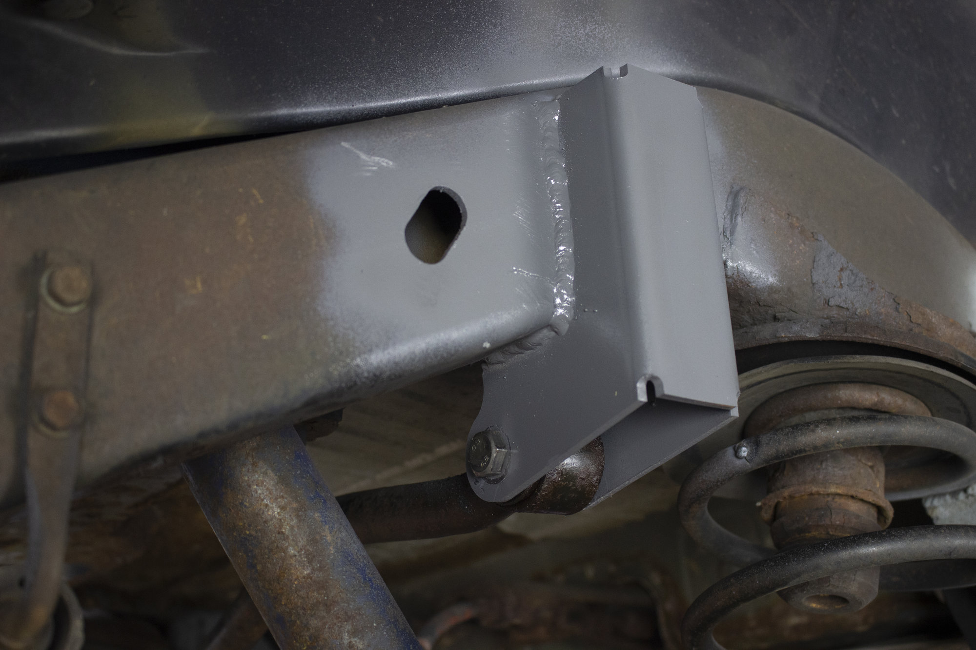 Rust Buster RB4023 Rear Upper Track Bar Bracket for 97-06 Jeep Wrangler TJ | Quadratec Rust Buster RB4023 Rear Upper Track Bar Bracket for 97-06 Jeep Wrangler TJ | Quadratec