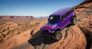 Purple Jeep with a desert background