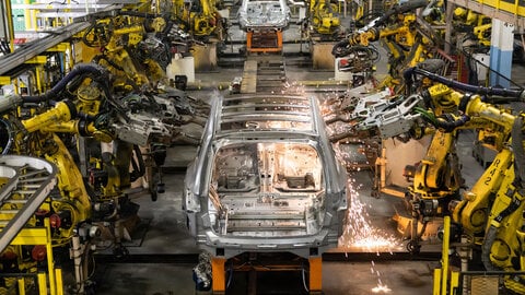 A Jeep vehicle body on a manufacturing line.